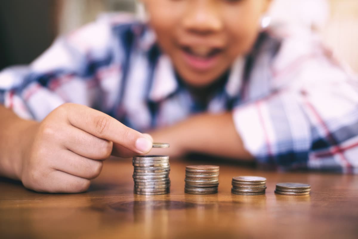 A child saving coins